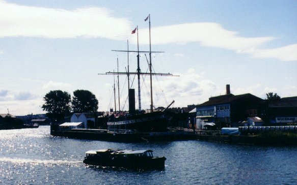 Bristol Harbor; A sailing ship behind a 'narrow boat'