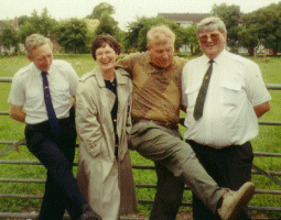 Bonnie and the coach drivers hang on while one of the guys kicks up his heels